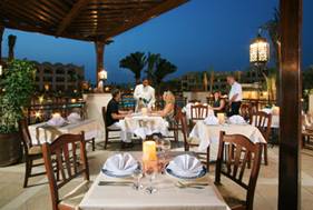 <b>Dining is a Breeze</b><br />Delicacies abound. Sea breezes caress the balmy evening air.<br />A romantic ambience soothes and relaxes.<br />